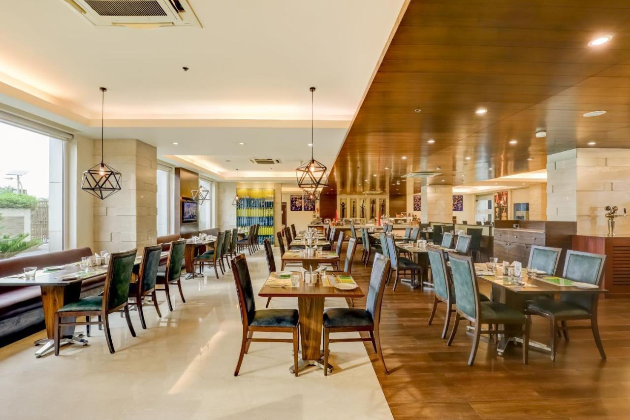 Hotel Lemon Tree Premier, Delhi Airport Nueva Delhi Exterior foto The restaurant