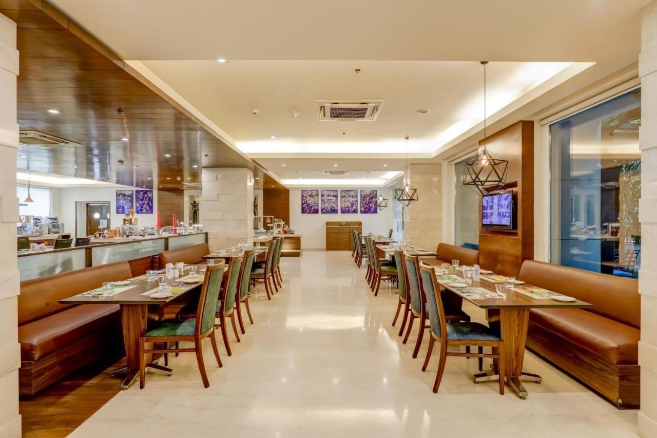 Hotel Lemon Tree Premier, Delhi Airport Nueva Delhi Exterior foto The interior of the restaurant